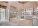 A spacious bathroom features large mirrors, dual vanities, and tile flooring at 9713 Highridge Dr, Las Vegas, NV 89134