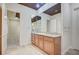 Bathroom featuring granite counters, sink, and tile floor at 9713 Highridge Dr, Las Vegas, NV 89134