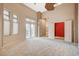 Spacious bedroom featuring carpet flooring, high ceilings, bright windows, and an adjoining room at 9713 Highridge Dr, Las Vegas, NV 89134