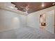 Bedroom with carpeted floor leading to a door to a dining and living space at 9713 Highridge Dr, Las Vegas, NV 89134