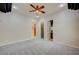 Bedroom featuring carpet and access to a walk-in closet and the bathroom at 9713 Highridge Dr, Las Vegas, NV 89134