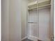 Walk-in closet featuring multiple shelves and racks for storage at 9713 Highridge Dr, Las Vegas, NV 89134