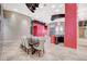 Spacious dining area with modern lighting, stylish decor, and an open layout at 9713 Highridge Dr, Las Vegas, NV 89134
