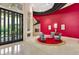 Elegant foyer showcasing marble floors, unique architecture, and a cozy seating area by the door at 9713 Highridge Dr, Las Vegas, NV 89134
