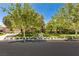A lush front yard with mature trees enhances the curb appeal of this home at 9713 Highridge Dr, Las Vegas, NV 89134