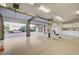 Three car garage with ample storage, work out area, and easy access to the outdoors at 9713 Highridge Dr, Las Vegas, NV 89134