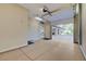 Attached garage with an open door, revealing extra workout space and parking area at 9713 Highridge Dr, Las Vegas, NV 89134