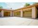 Spacious garage with storage cabinets and ample parking space, perfect for car enthusiasts or extra storage needs at 9713 Highridge Dr, Las Vegas, NV 89134