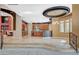 Gourmet kitchen with stainless steel appliances and granite countertops, adjacent to the formal dining area at 9713 Highridge Dr, Las Vegas, NV 89134