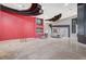 Open concept living area featuring a bar, dining area and striking architectural elements at 9713 Highridge Dr, Las Vegas, NV 89134
