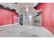 Spacious living area features travertine floors, a modern fireplace, and a grand entrance with abundant light at 9713 Highridge Dr, Las Vegas, NV 89134