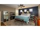 Comfortable primary bedroom featuring a neutral palette, natural light, and decorative rug at 9925 Turquoise Glass Ct, Las Vegas, NV 89178