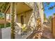 This backyard features a covered patio and outdoor seating area for relaxation at 10931 Sardinia Sands Dr, Las Vegas, NV 89141
