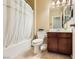 Bathroom showcasing a tub, toilet, and vanity at 10931 Sardinia Sands Dr, Las Vegas, NV 89141