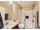 Well-lit bathroom with shower and vanity sink at 10931 Sardinia Sands Dr, Las Vegas, NV 89141