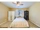 Bright bedroom with ceiling fan and wardrobe storage at 10931 Sardinia Sands Dr, Las Vegas, NV 89141