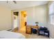Cozy bedroom with desk and view into the bathroom at 10931 Sardinia Sands Dr, Las Vegas, NV 89141
