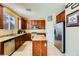 Spacious kitchen features granite counters, stainless steel appliances, a center island, and abundant cabinet space at 10931 Sardinia Sands Dr, Las Vegas, NV 89141