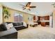 Open-concept living room with a sofa and a view of the kitchen at 10931 Sardinia Sands Dr, Las Vegas, NV 89141