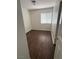 A secondary bedroom featuring modern vinyl floors, ample natural light, and neutral paint at 1153 Stormy Valley Rd, Las Vegas, NV 89123
