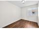 Well-lit bedroom boasts wood-look flooring, perfect for comfort and style at 1153 Stormy Valley Rd, Las Vegas, NV 89123
