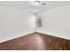 Bright bedroom features wood-look flooring and a window for natural light at 1153 Stormy Valley Rd, Las Vegas, NV 89123