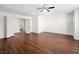 Spacious bedroom with ceiling fan and wood-look flooring, creating a cozy space at 1153 Stormy Valley Rd, Las Vegas, NV 89123