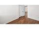 Bedroom with wood-look flooring and a closet, providing convenient storage at 1153 Stormy Valley Rd, Las Vegas, NV 89123