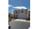 Two-story home featuring a tile roof, stucco exterior, and an attached two-car garage at 1153 Stormy Valley Rd, Las Vegas, NV 89123