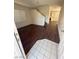 Entryway with living room featuring vinyl floors, fireplace, and stairs leading to the second floor at 1153 Stormy Valley Rd, Las Vegas, NV 89123