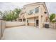 This property features a private fenced backyard with ample patio space at 1580 Wild Willey Way, Henderson, NV 89002