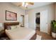 Comfortable bedroom with a queen bed, carpeted floors, closet space and ceiling fan at 1580 Wild Willey Way, Henderson, NV 89002
