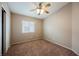 Bedroom with carpet floor, ceiling fan, and window with blinds at 1580 Wild Willey Way, Henderson, NV 89002