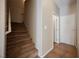 View of the carpeted staircase leading to the second story at 1580 Wild Willey Way, Henderson, NV 89002