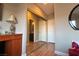 Bedroom view features a large closet with mirrored doors and wood-style flooring at 1800 Edmond St # 218, Las Vegas, NV 89146