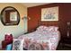 Comfortable bedroom with colorful bedspread and accents at 1800 Edmond St # 218, Las Vegas, NV 89146