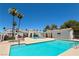Resort-style community pool with lounge area, perfect for relaxing and enjoying the sunny weather at 1800 Edmond St # 218, Las Vegas, NV 89146