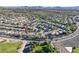 Neighborhood aerial showcases mature trees, single-Gathering homes, and nearby park at 2309 Tedesca Dr, Henderson, NV 89052