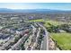 An aerial view highlights the property's location within a neighborhood and its proximity to green spaces at 2309 Tedesca Dr, Henderson, NV 89052