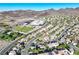 Aerial view of a residential area with a nearby school and sports field at 2309 Tedesca Dr, Henderson, NV 89052