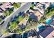 Aerial view of backyard with pools, spas, firepit, and mature landscaping at 2309 Tedesca Dr, Henderson, NV 89052