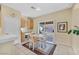 Cozy dining area with a sliding door to the backyard, next to the kitchen and featuring tile flooring at 2309 Tedesca Dr, Henderson, NV 89052