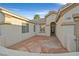 Charming front patio featuring a stamped concrete design and inviting entryway to the home at 2309 Tedesca Dr, Henderson, NV 89052