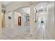 Open-concept living room showcasing tile flooring, modern architectural details, and plenty of natural light at 2309 Tedesca Dr, Henderson, NV 89052