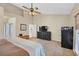 Main bedroom with carpet flooring, ceiling fan, and ensuite bathroom with glass shower at 2309 Tedesca Dr, Henderson, NV 89052