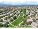 Aerial view of a peaceful neighborhood with green park and residential homes at 2309 Tedesca Dr, Henderson, NV 89052