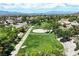 Serene park view with walking paths and lush greenery, perfect for outdoor activities and relaxation at 2309 Tedesca Dr, Henderson, NV 89052