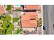 Birds eye view of landscaped backyard featuring artificial turf and garden at 2704 Miraflores Ave, Las Vegas, NV 89102