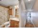Bathroom with tile floors, a light wood vanity, a shower and a neutral color palette at 2704 Miraflores Ave, Las Vegas, NV 89102