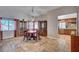 Inviting dining area with built-in cabinets and a view into the adjacent kitchen at 2704 Miraflores Ave, Las Vegas, NV 89102